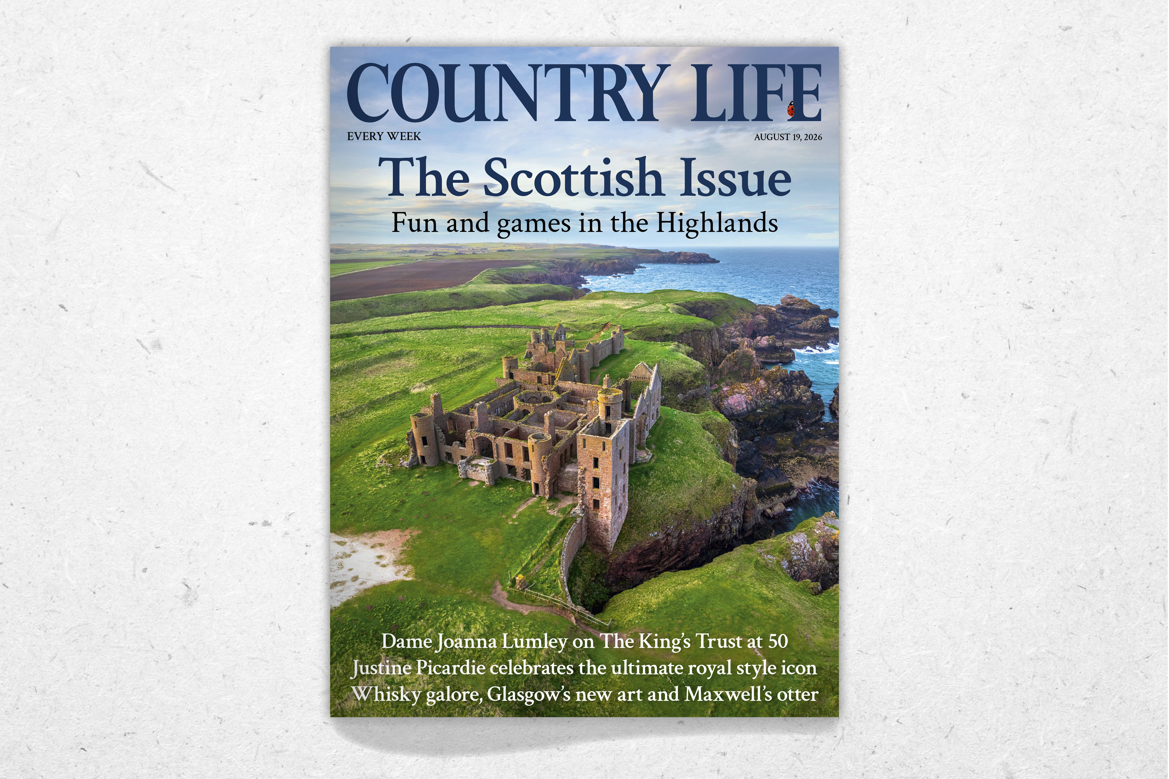 The front cover of Country Life magazine, featuring the shell of a Scottish castle on a coastline, viewed from above.