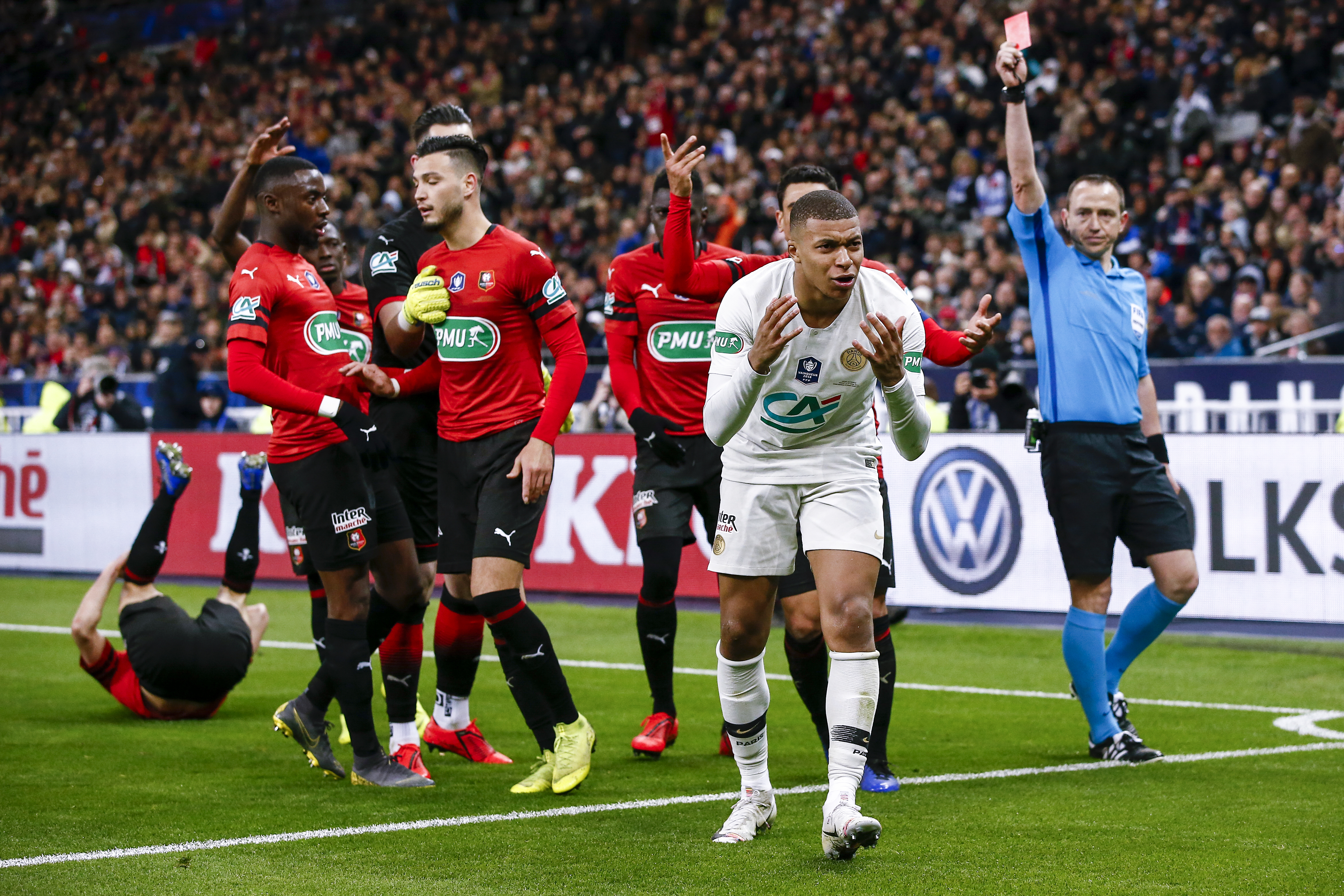 Paris Saint-Germain's Kylian Mbappe reacts in disbelief after he is shown the red card in the 2019 Coupe de France final against Rennes.