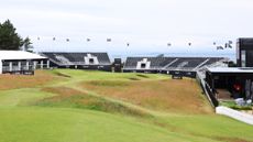 A par 3 at the Genesis Scottish Open featuring big grandstands and a sea view