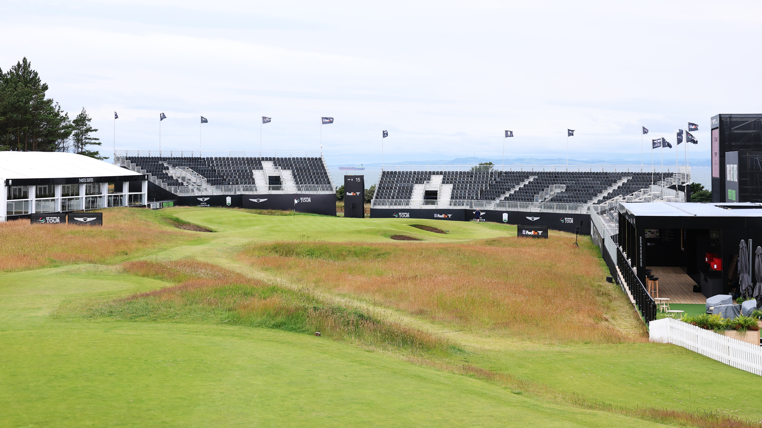 A par 3 at the Genesis Scottish Open featuring big grandstands and a sea view