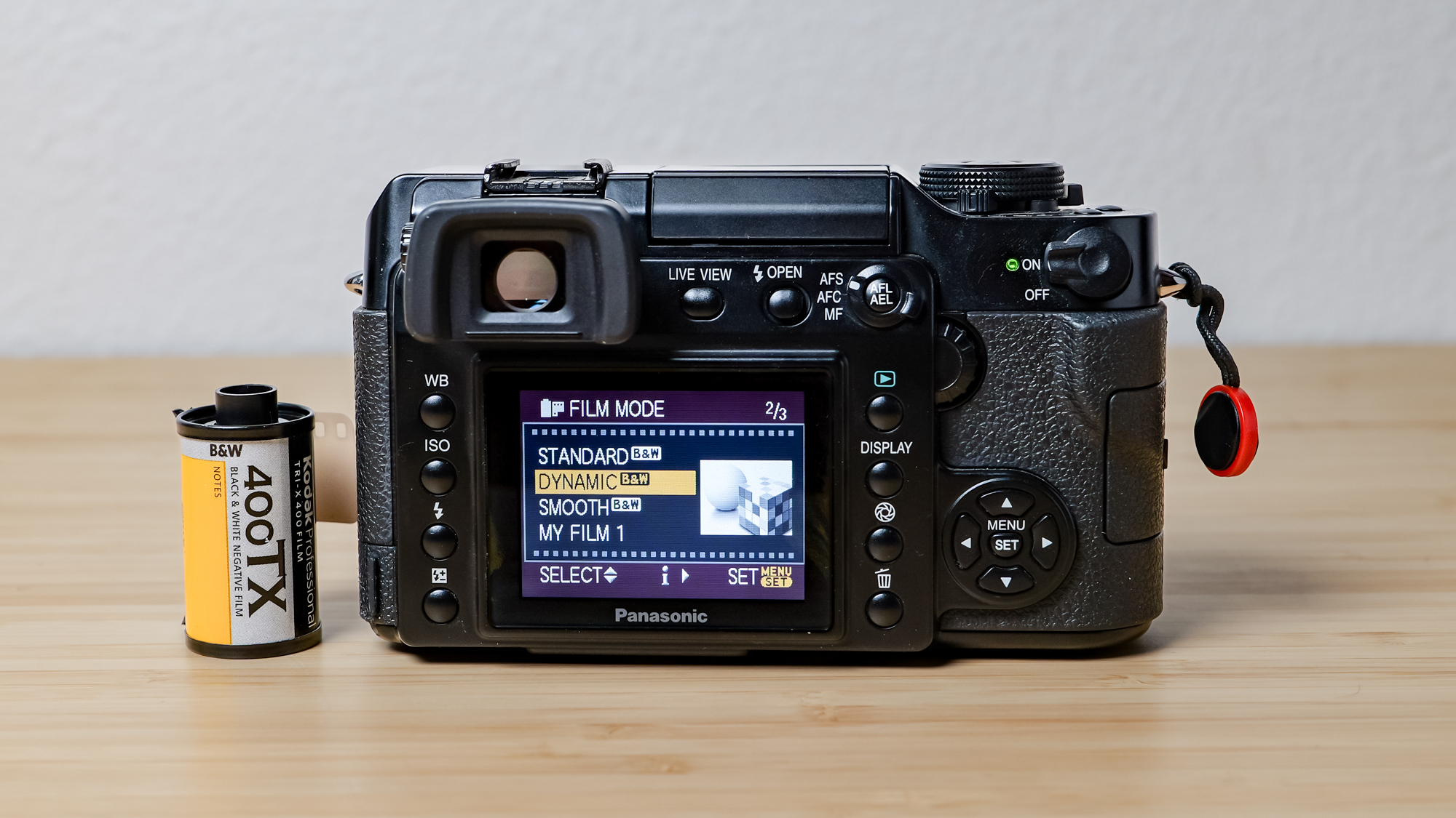 A photo of the Lumix L1 DSLR on a wooden surface