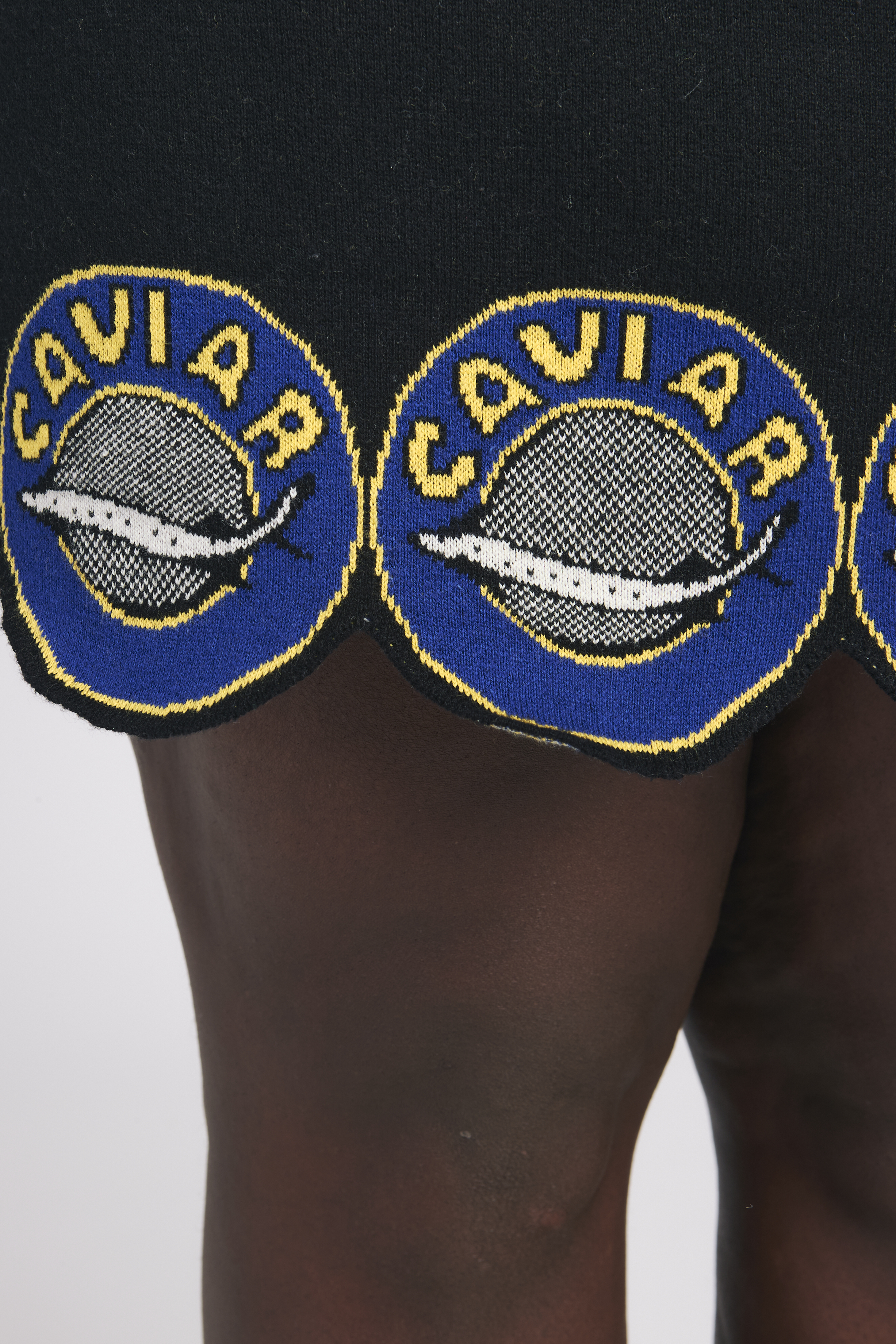 a close up of a caviar knit skirt