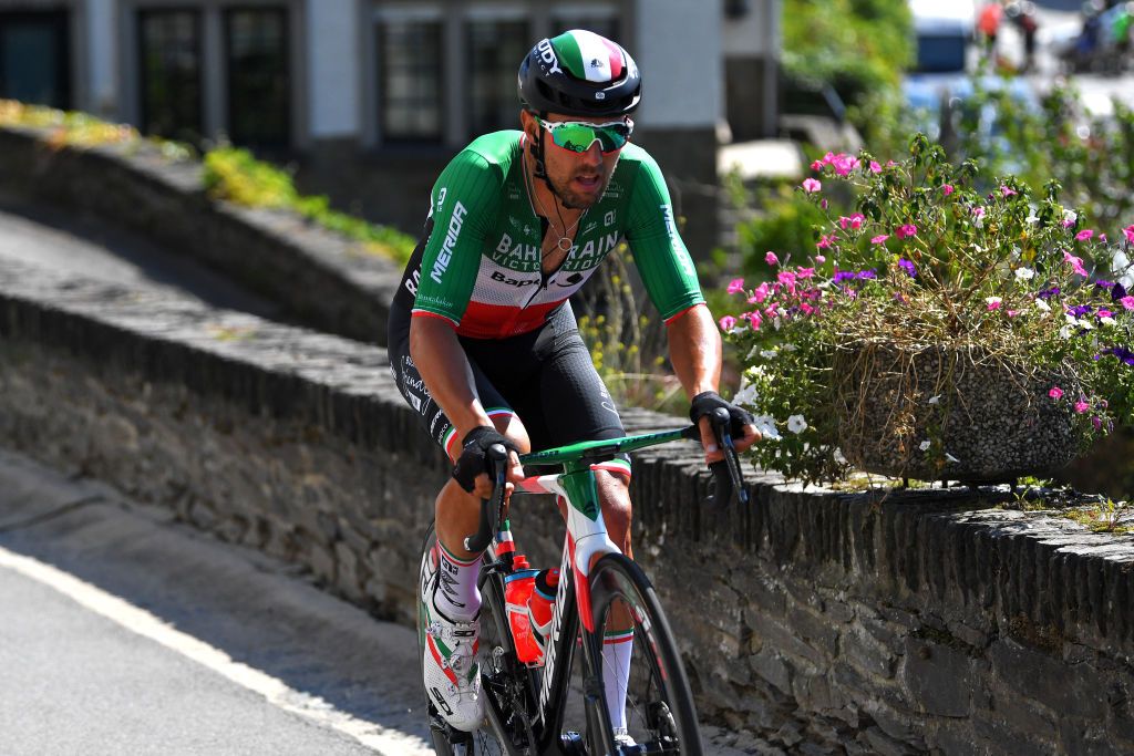 HOUFFALIZE BELGIUM SEPTEMBER 04 Sonny Colbrelli of Italy and Team Bahrain Victorious competes in the breakaway during the 17th Benelux Tour 2021 Stage 6 a 2076km stage from OttigniesLouvainlaNeuve to Houffalize BeneluxTour on September 04 2021 in Houffalize Belgium Photo by Luc ClaessenGetty Images