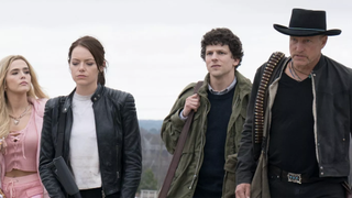 A still from the movie Zombieland: Double Tap in which the main characters, Little Rock, Wichita, Columbus and Tallahassee, are all walking solemnly side by side.