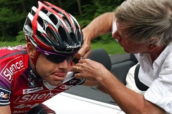 Dr. Gerard Porte treats Evans' left shoulder after the Australian crashed hard in a left-hand bend.