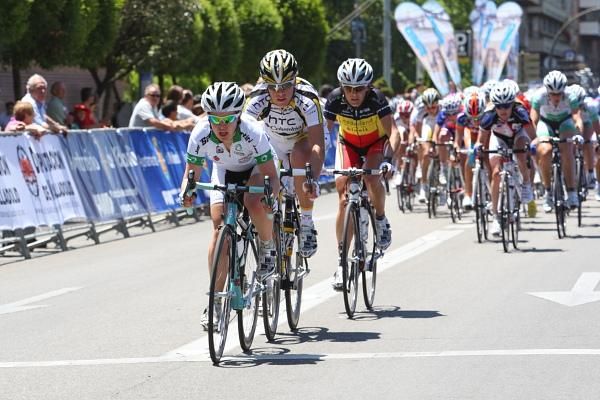 Amanda Spratt (Australia) leads the bunch through the finish line with a lap to go