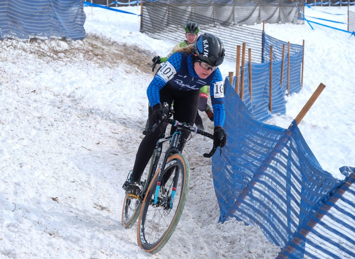 Ellen Noble (Aspire Racing) leading across an off-camber section as Emma White ran behind her