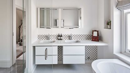 white bathroom with double vanity