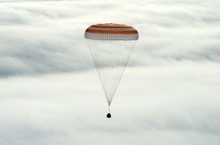 The Soyuz TMA-18M capsule returns from the International Space Station to a landing in Kazakhstan on March 2, 2016.