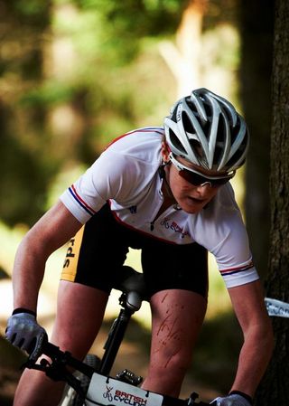 Annie Last racing through Dalby Forest during a national series race.