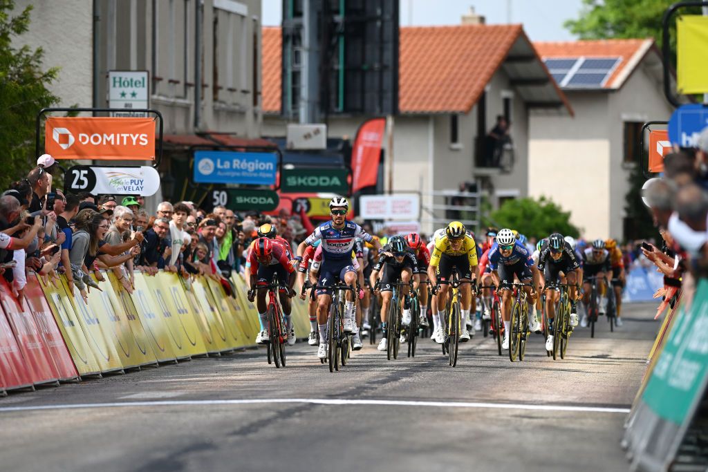 LA CHAISEDIEU FRANCE JUNE 05 Julian Alaphilippe of France and Team Soudal Quick Step celebrates at finish line as stage winner ahead of LR Natnael Tesfatsion of Eritrea and Team Trek Segafredo Richard Carapaz of Ecuador and Team EF EducationEasyPost and Christophe Laporte of France and Team JumboVisma Yellow Leader Jersey during the 75th Criterium du Dauphine 2023 Stage 2 a 1673km stage from BrassaclesMines to La ChaiseDieu 1080m UCIWT on June 05 2023 in La ChaiseDieu France Photo by Dario BelingheriGetty Images
