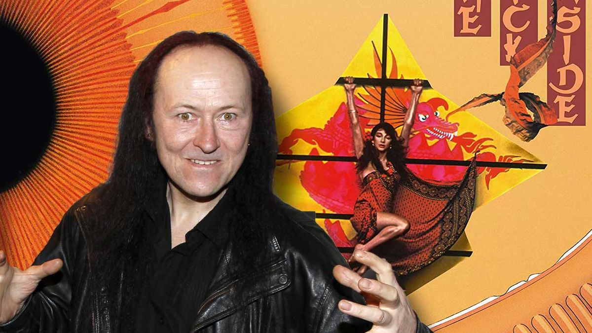 Cronos standing in front of the art for Kate Bush&#039;s The Kick Inside 