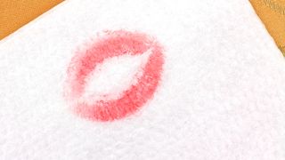 Lipstick stain on napkin