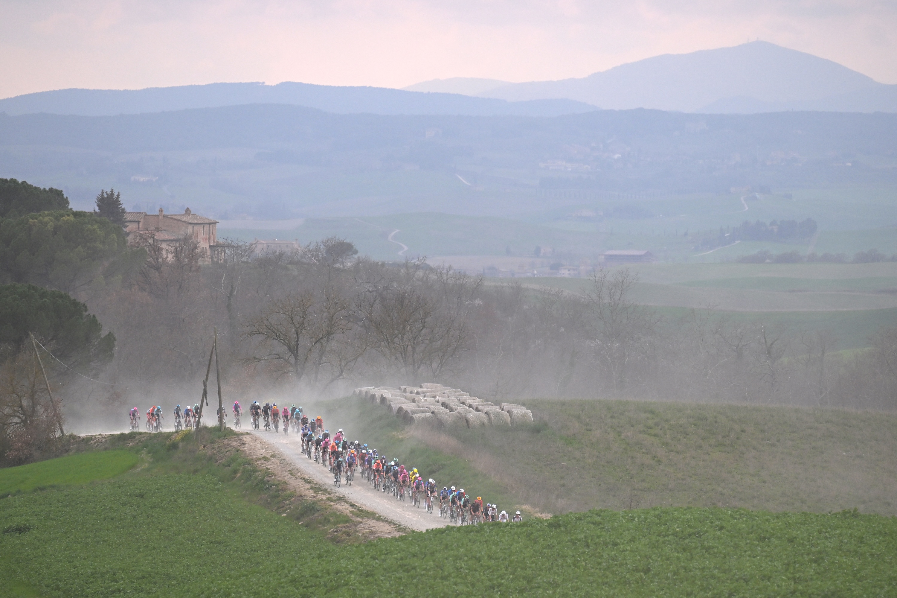 SIENA, ITALY - MARCH 07: A general view of the peloton passing through a landscape during the 20th Strade Bianche 2026 a 203km one day race from Siena to Siena / #UCIWT / on March 07, 2026 in Siena, Italy. (Photo by Tim de Waele/Getty Images)