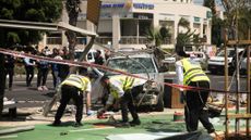 Security forces at the scene of a car ramming attack in Tel Aviv