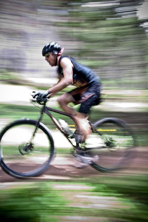 A rider whizzes by.