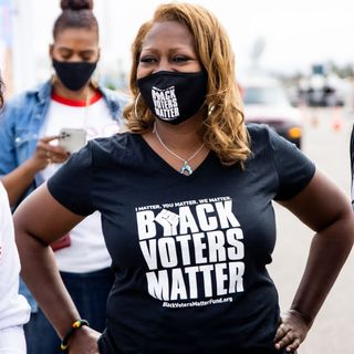 Woman wearing a black lives matter shirt