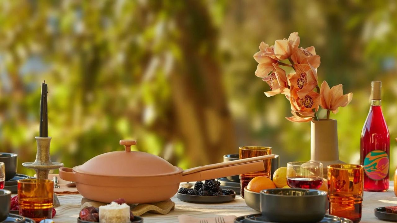 Our Place Always Pan in pink set up on an outdoor table