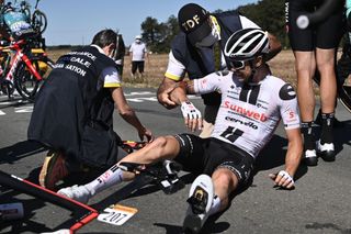 Team Sunweb rider Irelands Nicolas Roche is helped by medics after crashing during the 10th stage of the 107th edition of the Tour de France cycling race 170 km between Le Chateau dOleron and Saint Martin de Re on September 8 2020 Photo by AnneChristine POUJOULAT AFP Photo by ANNECHRISTINE POUJOULATAFP via Getty Images