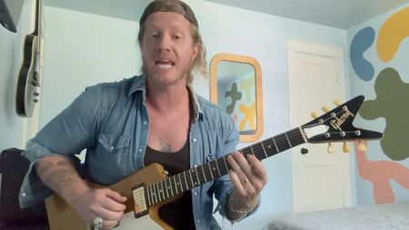 A still from Jared James Nichols' Guitar World video lesson, where he plays an Explorer with a split headstock