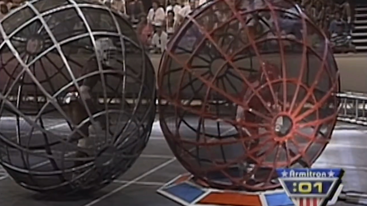 Competitors battling in Atlasphere cages on American Gladiators.