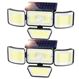 Two sets of security flood lights with four light panels and a solar panel on top