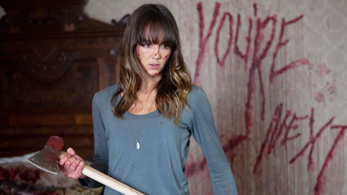 Sharni Vinson as Erin, holding an axe in &quot;You&#039;re Next&quot; (2011)