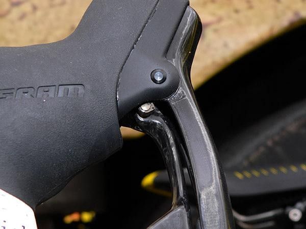 A small cam adjusts the reach on the shift paddle ; Mayo's levers appeared to be set at full extension for the time being.