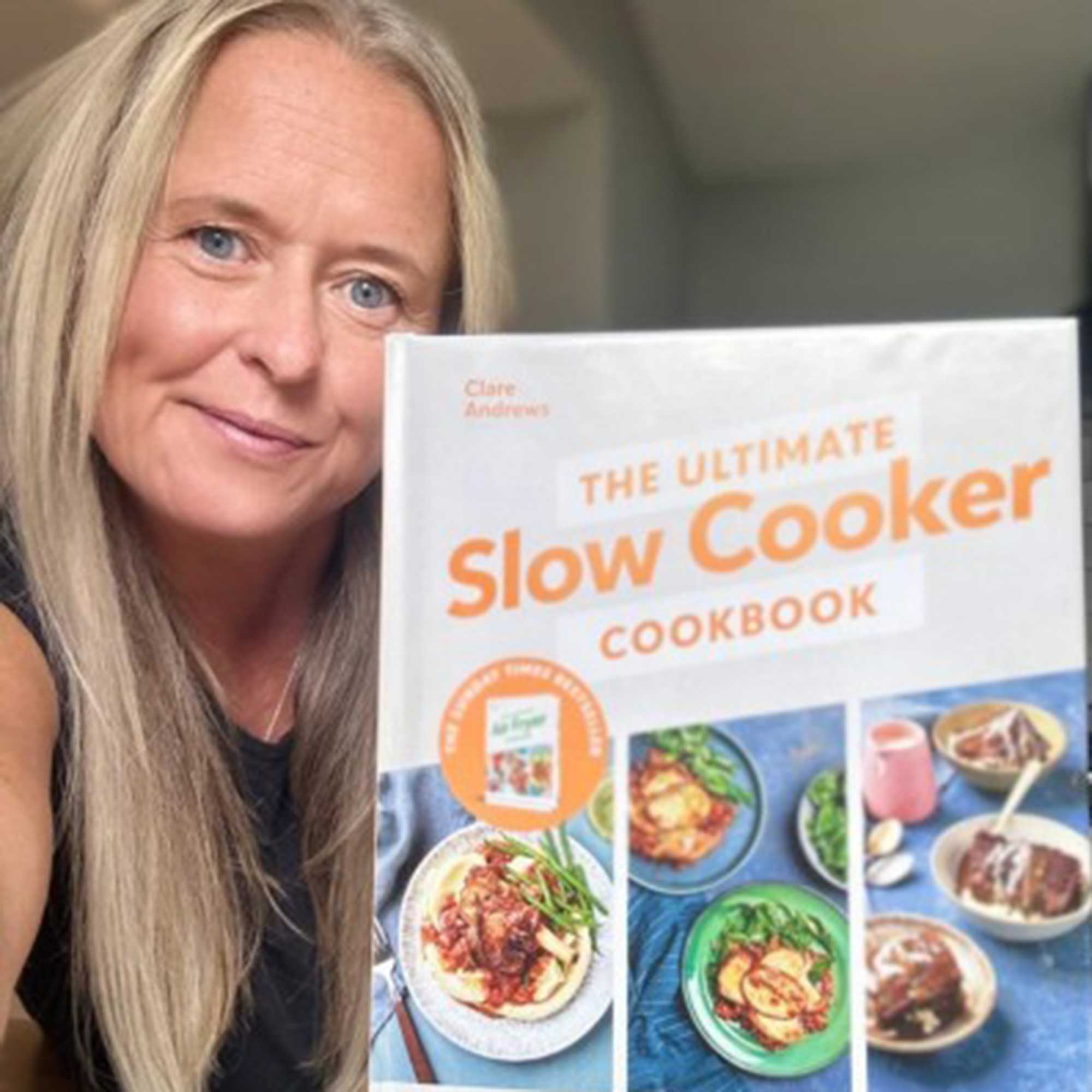 Author Clare Andrews with her slow cooker recipe book