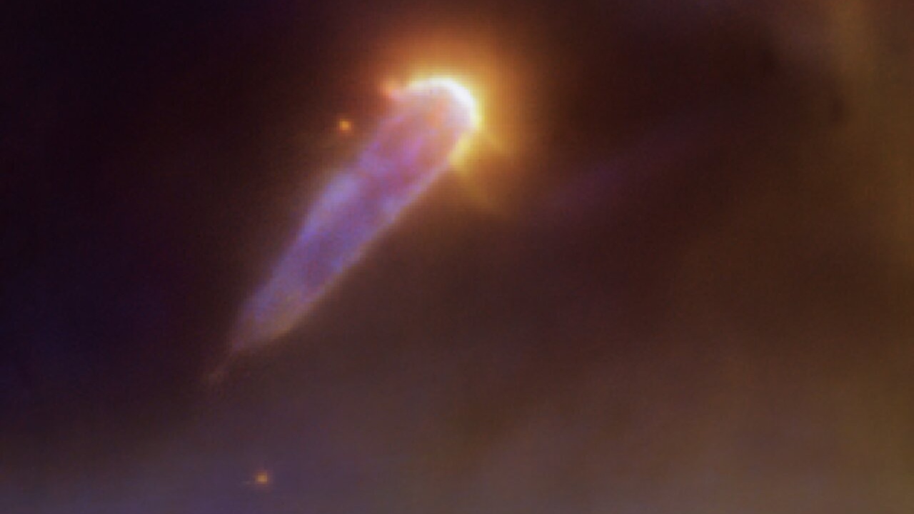 This planet-forming disk shaped like a comet is struggling to survive Space