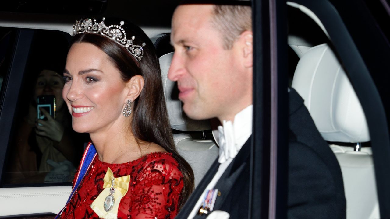 Prince William and Kate Middleton ride in a car to a reception