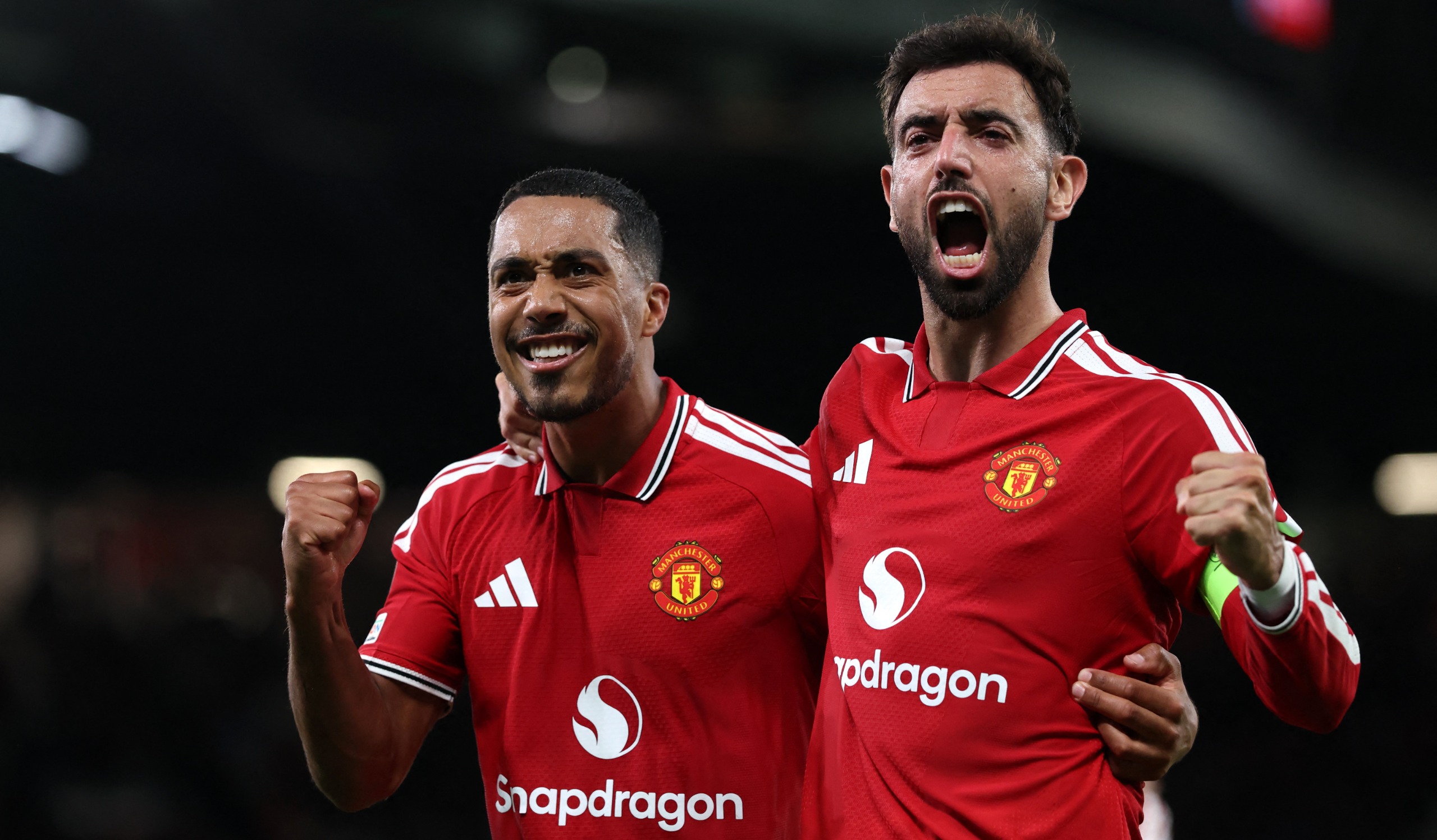 Bruno Fernandes celebrates scoring Manchester United's second goal with Youri Tielemans (L) during the UEFA Champions League match against Sabah FK at Old Trafford in Manchester, on September 10, 2026