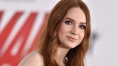 karen gillan on a white and red background