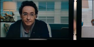 John Cusack as Kevin Christie in Utopia