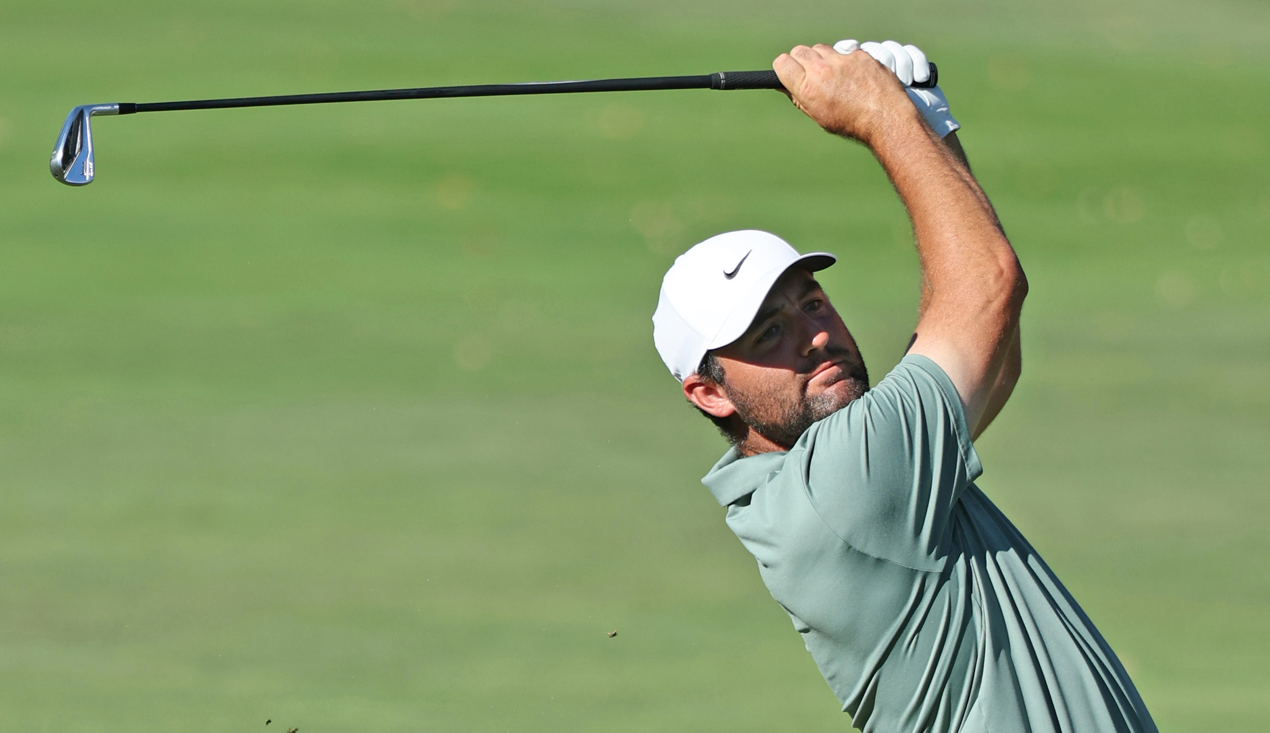 Scottie Scheffler hits a Srixon Utility Iron