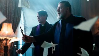 Father Esquibel (Daniel Zovatto) and Father Gabriele Amorth (Russell Crowe) in THE POPE’S EXORCIST.