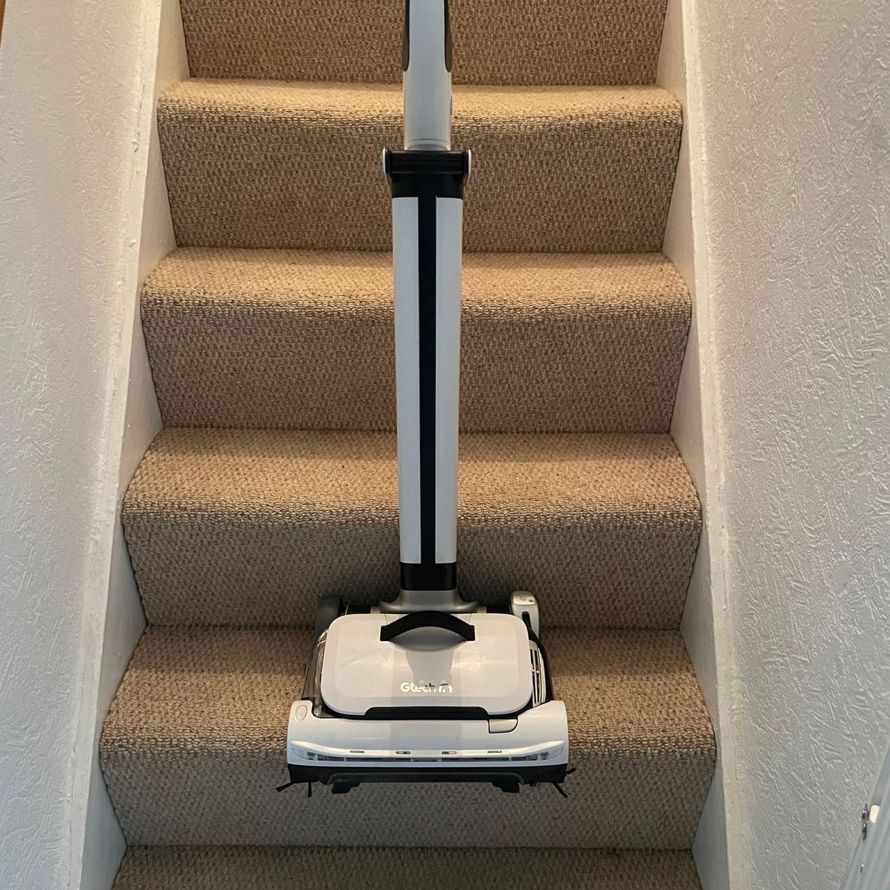 Gtech AirRam 3 on carpeted stairs