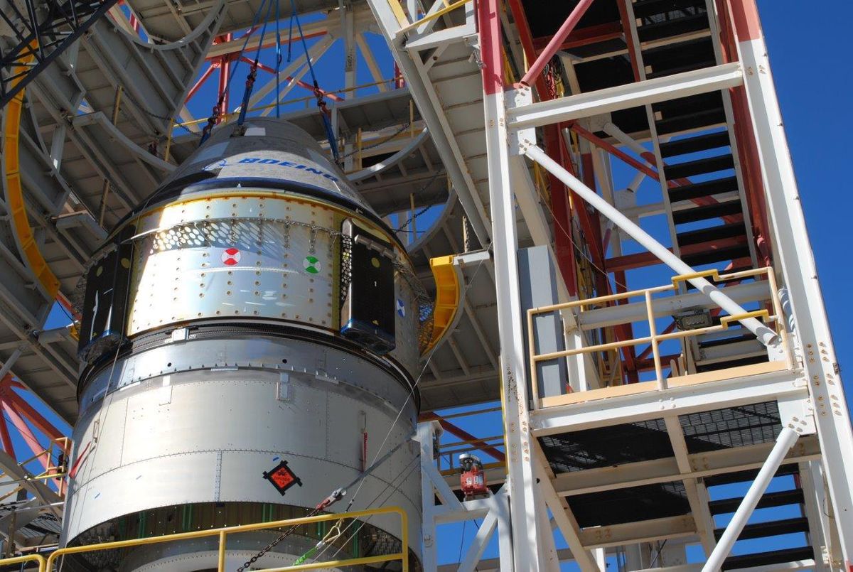 A Boeing CST-100 Starliner capsule is prepared for a critical launch abort system test at White Sands Missile Range in New Mexico. The Nov. 4, 2019 test will demonstrate a critical safety system for crewed launches.