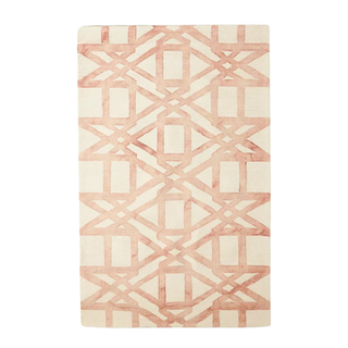 A pink and white hand tufted rug