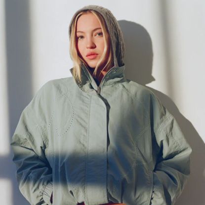 Lila Moss wearing blue track jacket from her Adanola collection