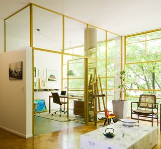 The flat also includes a separate glass-enclosed study room