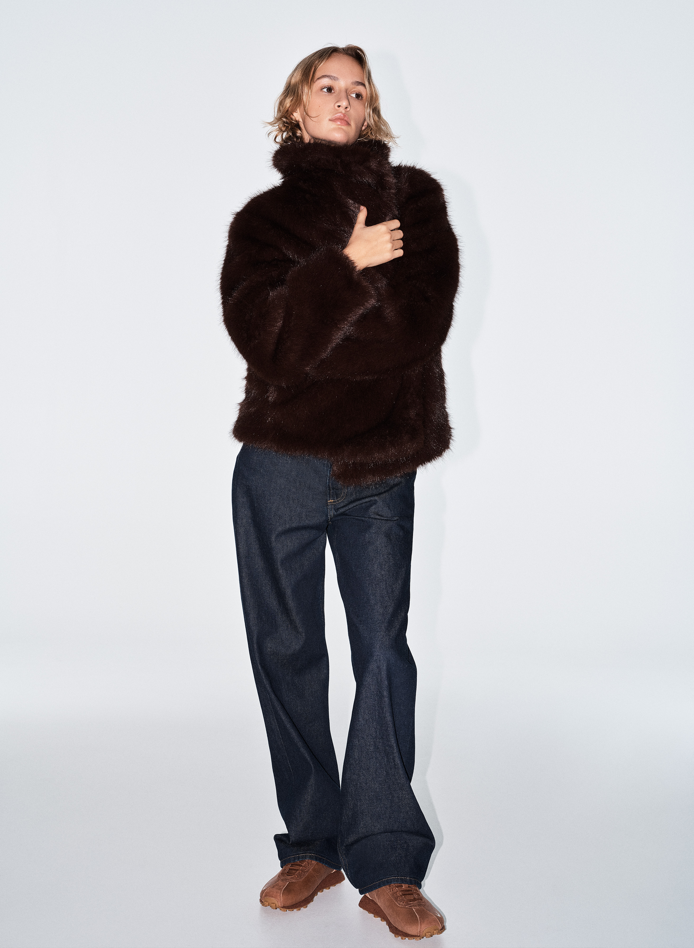 a model wearing the Nike x Aritzia sneaker collaboration