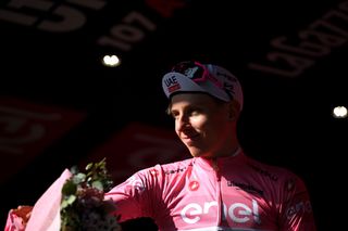 LUCCA ITALY MAY 08 Tadej Pogacar of Slovenia and UAE Team Emirates Pink Leader Jersey celebrates at podium during the 107th Giro dItalia 2024 Stage 5 a 178km stage from Genova to Lucca UCIWT on May 08 2024 in Lucca Italy Photo by Dario BelingheriGetty Images