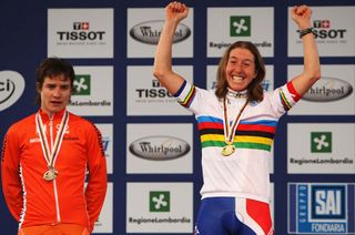 A happy Nicole Cooke her 2008 win next to a disappointed looking Marianne Vos