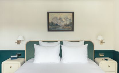 Bed and bedside tables in the Experimental Chalet in Verbier, Switzerland