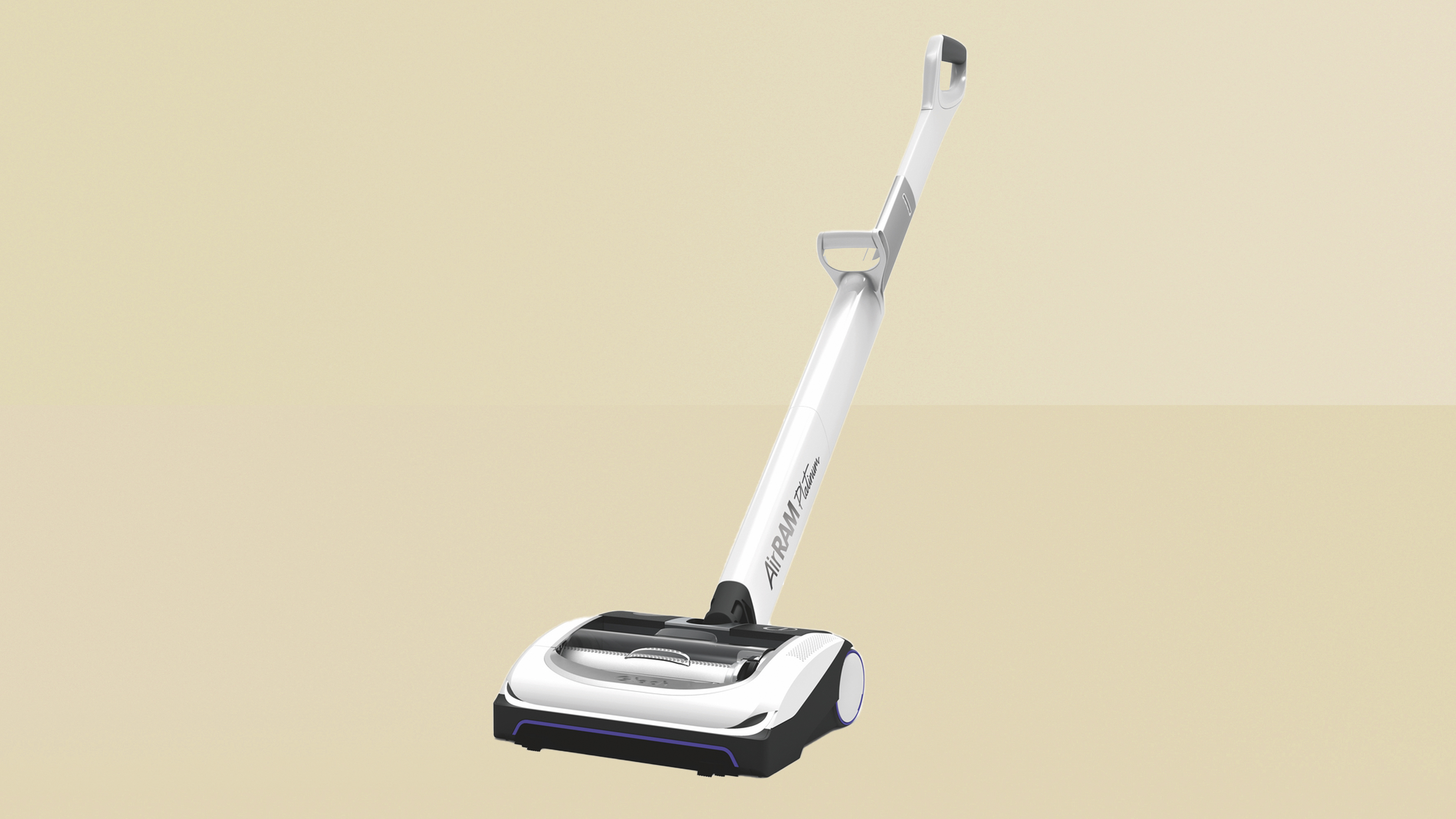 Gtech AirRAM Platinum on yellow background