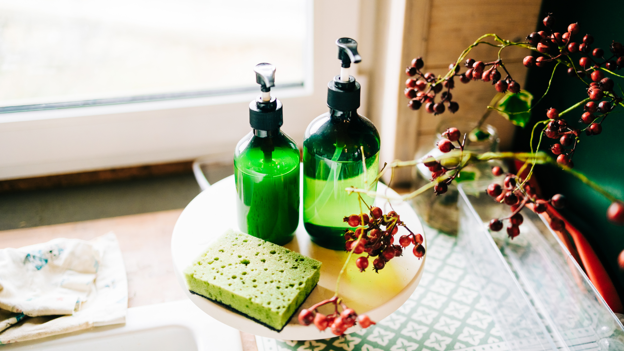 soap dispensers next to sink 