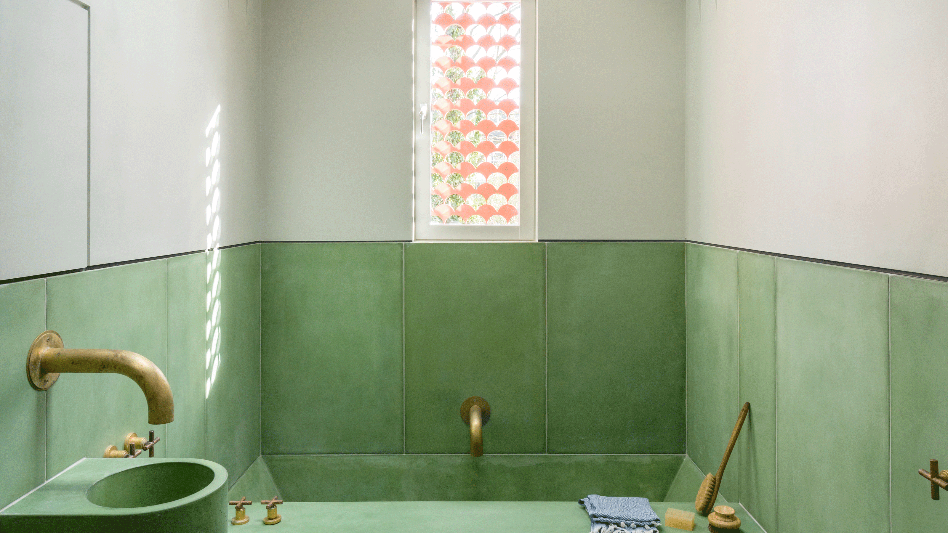 colored concrete bathroom with green bottom half
