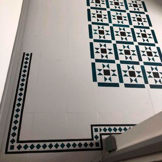 white floor with stencil design