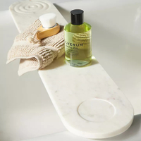 1. Mercedes Marble Bath Caddy: View at Anthropologie